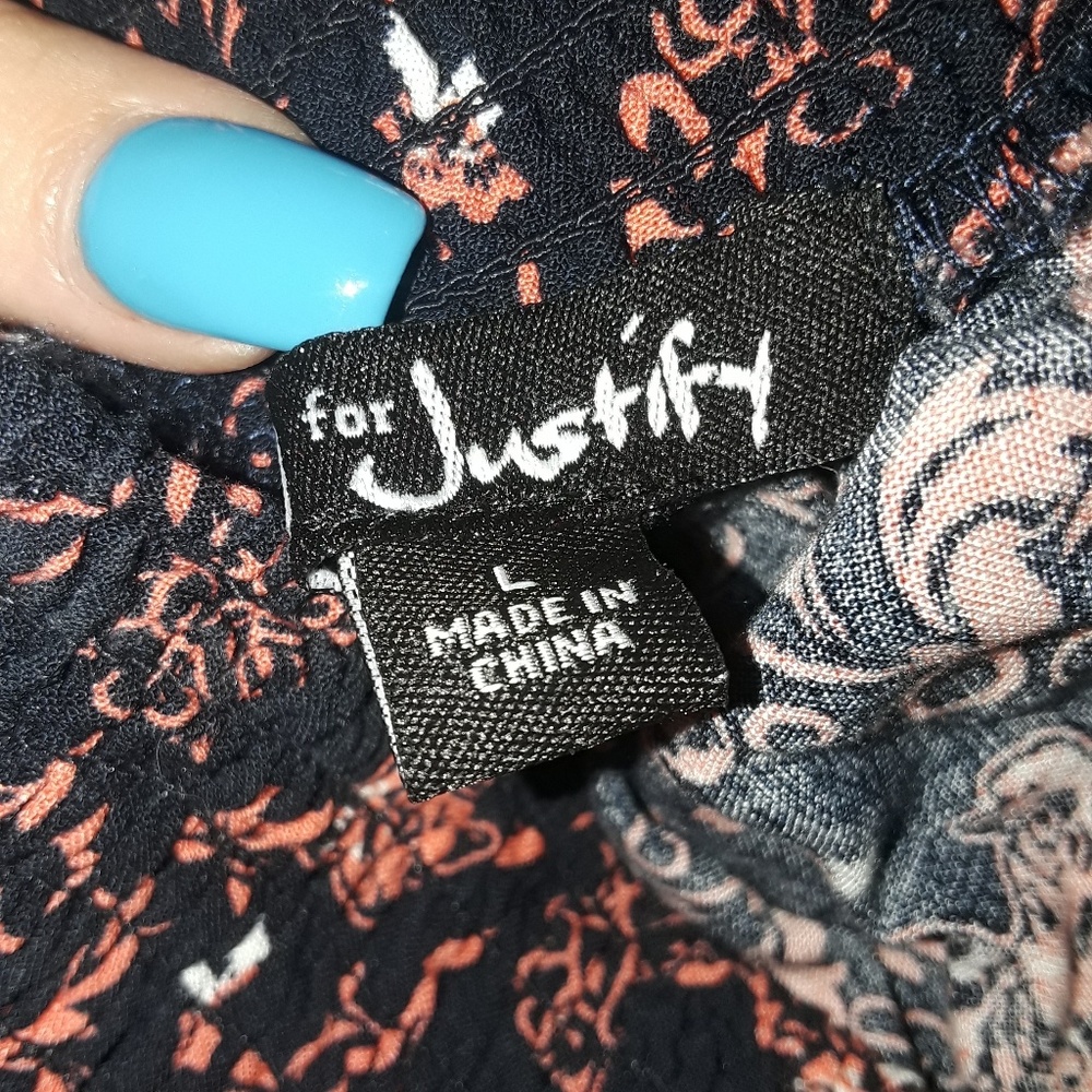 Orange and black strapless romper